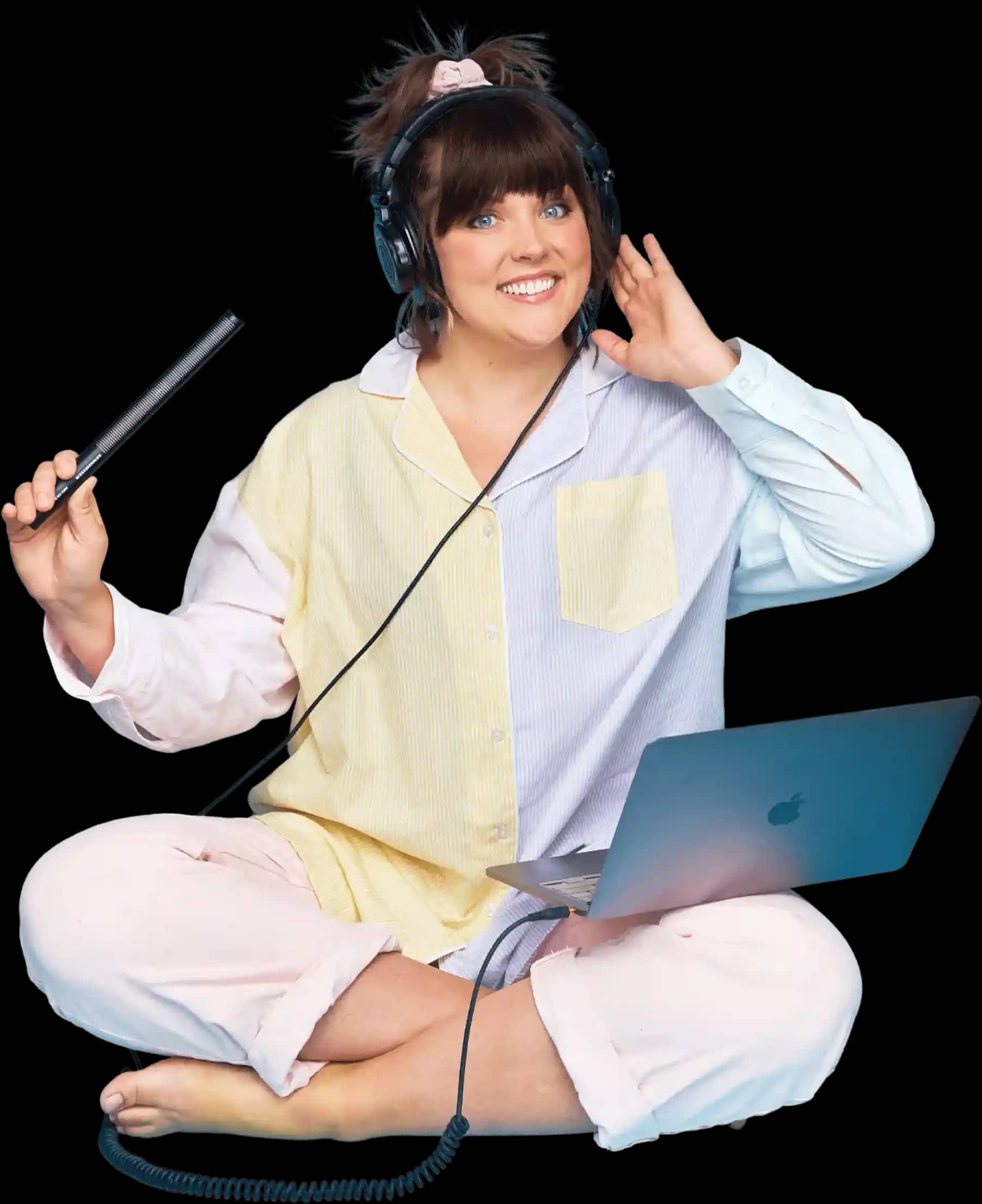 Jenna Pinachbeck Sitting with Mic in Hand